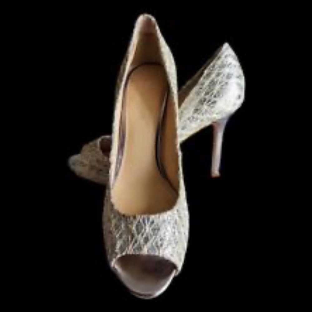 ENZO ANGIOLINI silver sparkle heels.